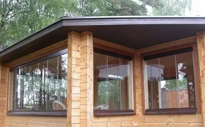 Скління тераси дерев’яного будинку
