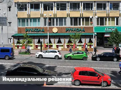 Маркізи за індивідуальним проєктом над фасадом ресторану